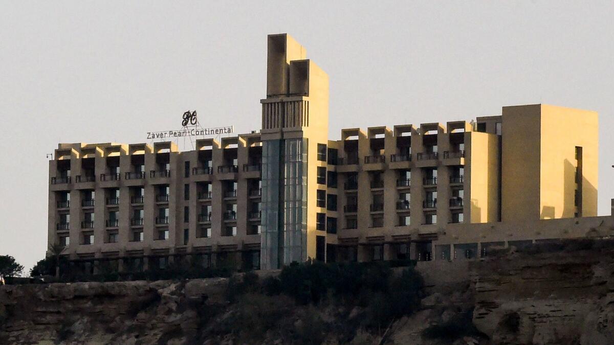 This picture taken on March 8, 2019 shows a general view of the five-star Pearl Continental hotel located on a hill in the southwestern Pakistani city of Gwadar, where gunmen stormed the building.