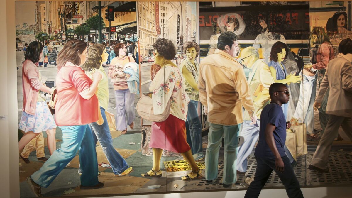 Artist John Valadez's "The Broadway Mural" (1981) hangs in the Santa Monica offices of the Rand Corp.