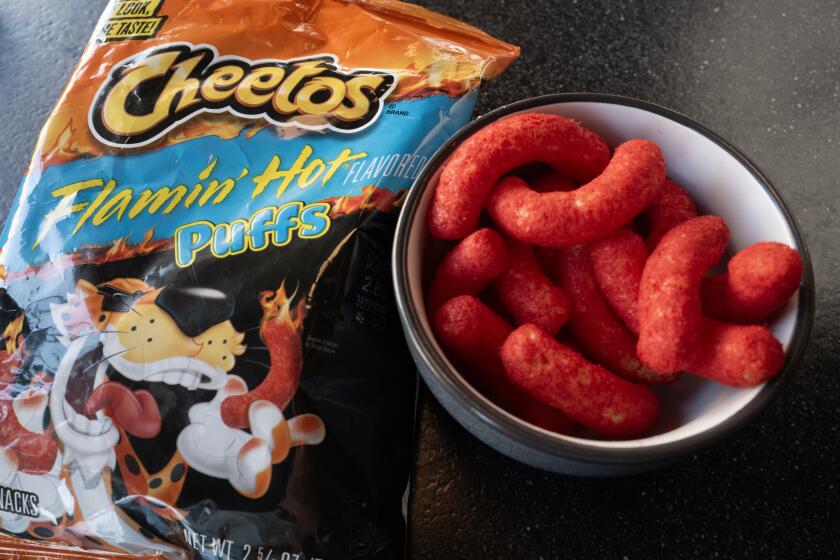 CHICAGO, ILLINOIS - APRIL 19: In this photo illustration, Flamin' Hot Cheetos are shown on April 19, 2024 in Chicago, Illinois. Several US states are seeking to ban certain candies, cereals and snack foods because they contain chemicals that are linked to health issues. Among the foods and snacks that may be banned are Lucky Charms and Froot Loops cereals, Flamin’ Hot Cheetos, Doritos and candies including Skittles, Nerds, M&M’s and Swedish Fish. (Photo Illustration by Scott Olson/Getty Images)
