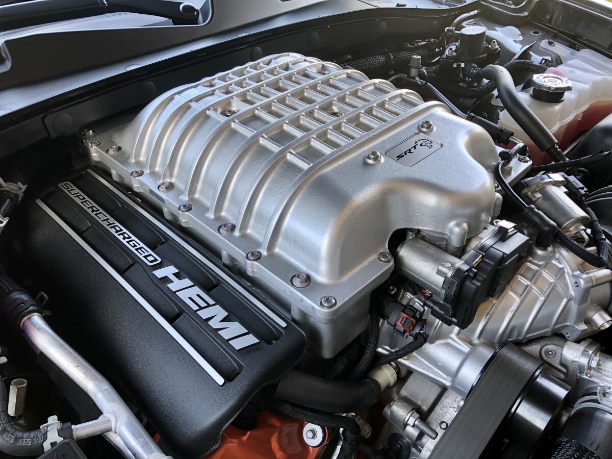 The Hellcat’s 707-hp, supercharged 6.2-liter Hemi pushrod V-8 has a tire-boiling 650 foot-pounds of torque at 4,800 rpm.