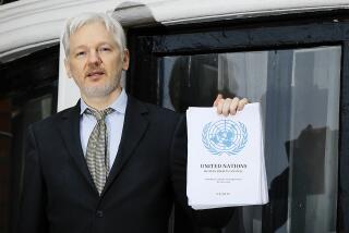 FILE - WikiLeaks founder Julian Assange speaks on the balcony of the Ecuadorean Embassy in London, Feb. 5, 2016. Assange will plead guilty to a felony charge in a deal with the U.S. Justice Department that will free him from prison and resolve a long-running legal saga over the publication of a trove of classified documents. (AP Photo/Kirsty Wigglesworth, File)