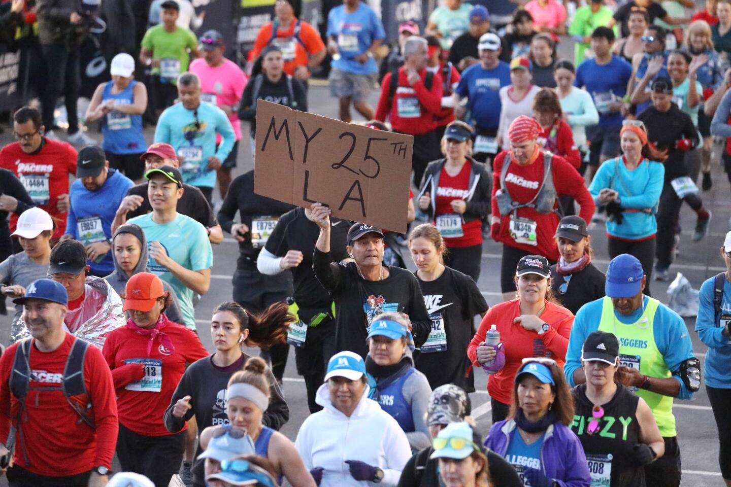 One runner shows his dedication to running the marathon at the start of the 35th L.A. Marathon at Dodger Stadium.