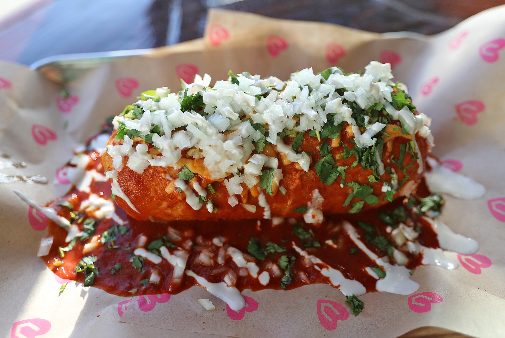 A classico burrito smothered in red sauce at Chicana Plant-based Grub in Fullerton.