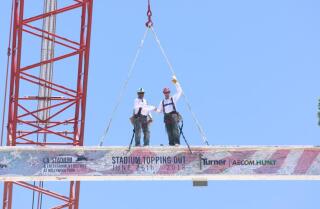 Final steel beam placed in new Rams stadium construction