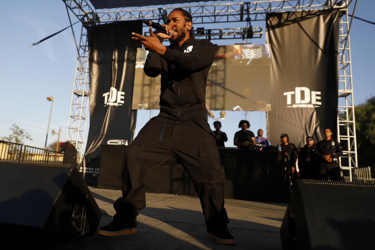 Kendrick Lamar performs at the annual Top Dawg concert and toy drive.