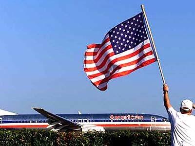 An American Airlines plane lands at John Wayne Airport