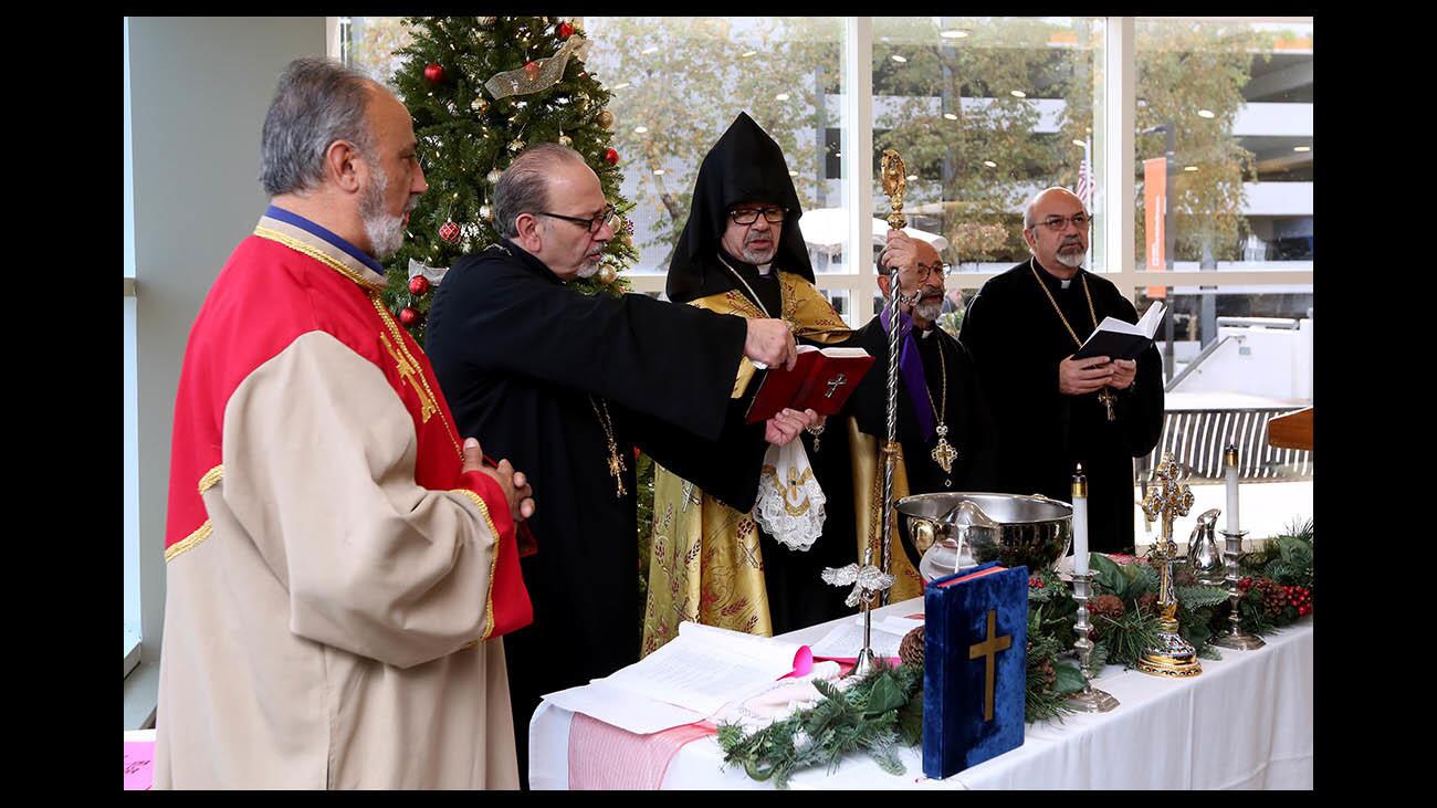 H.E. Archbishop Moushegh Mardirossian, Prelate, center, officiated over the Armenian Christmas Service at Dignity Health Glendale Memorial Hospital and Health Center in Glendale on Tuesday, January 8, 2019.