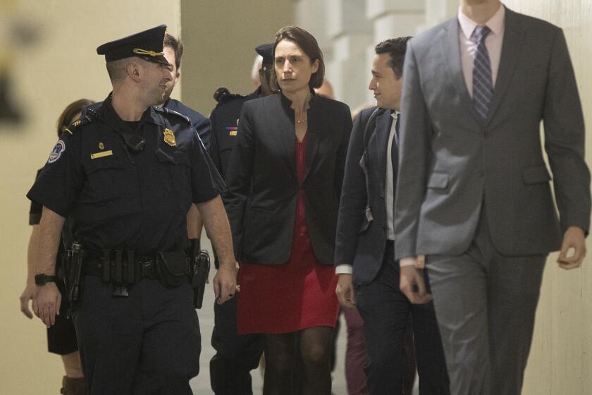 Former White House advisor on Russia, Fiona Hill, leaves Capitol Hill in Washington, Monday, Oct. 14, 2019, after testifying before congressional lawmakers as part of the House impeachment inquiry into President Donald Trump. (AP Photo/Manuel Balce Ceneta)