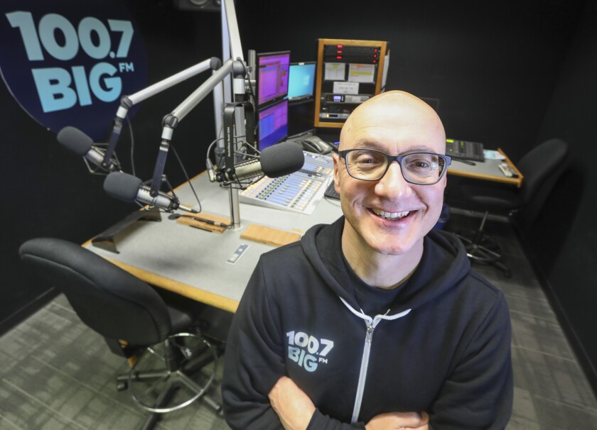 Program director Garett Michaels is shown in the Sorrento Valley studios of 100.7 BIG-FM. The station formerly known as 100.7 KFMB-FM was purchased last year by Local Media San Diego. It kicked off with a new name and new format on April 13, 2020.