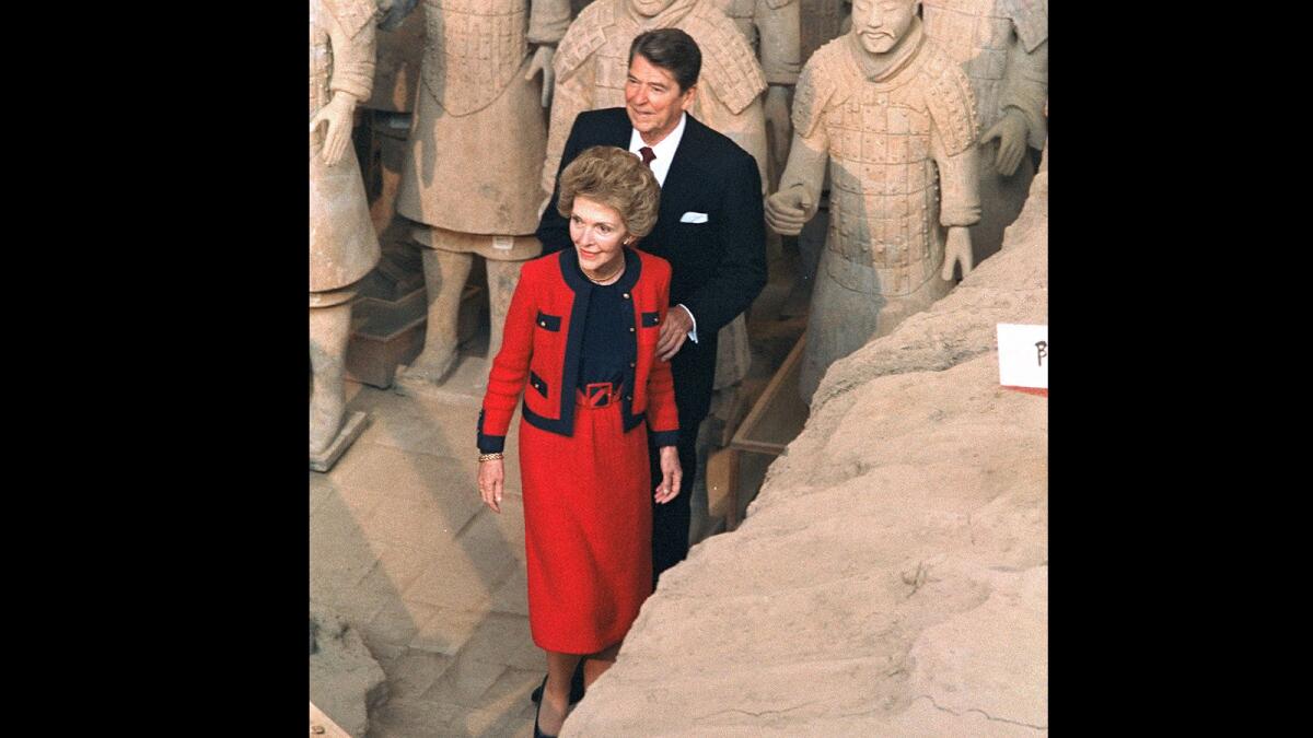 President and Nancy Reagan view the terra cotta warriors near Xi'an, China, in April 1984.