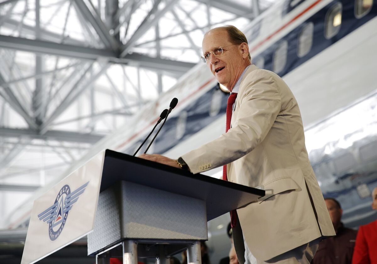 Delta Air Lines CEO Richard Anderson speaks at the grand opening of the new Delta Flight Museum in Atlanta. A recent comment from Anderson about 9/11 has escalated a dispute between U.S. airlines and fast-growing Persian Gulf competitors.