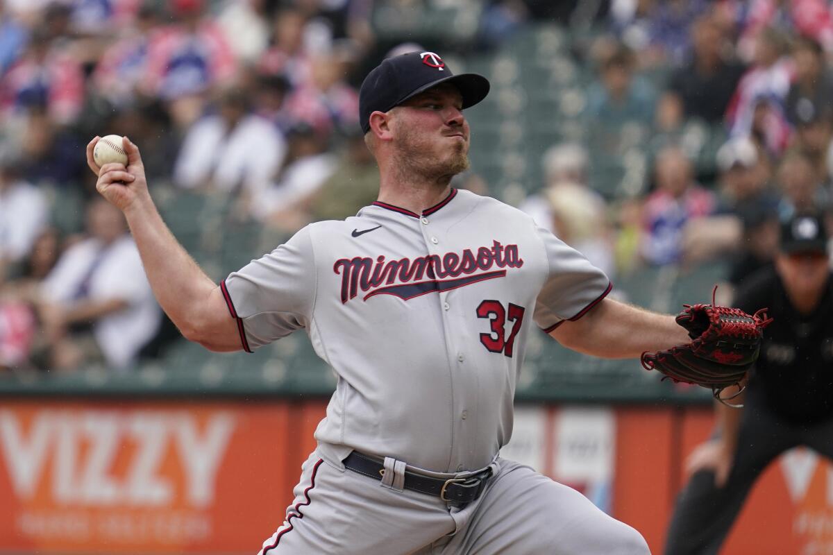 Minnesota Twins starting pitcher Chris Archer throws against the