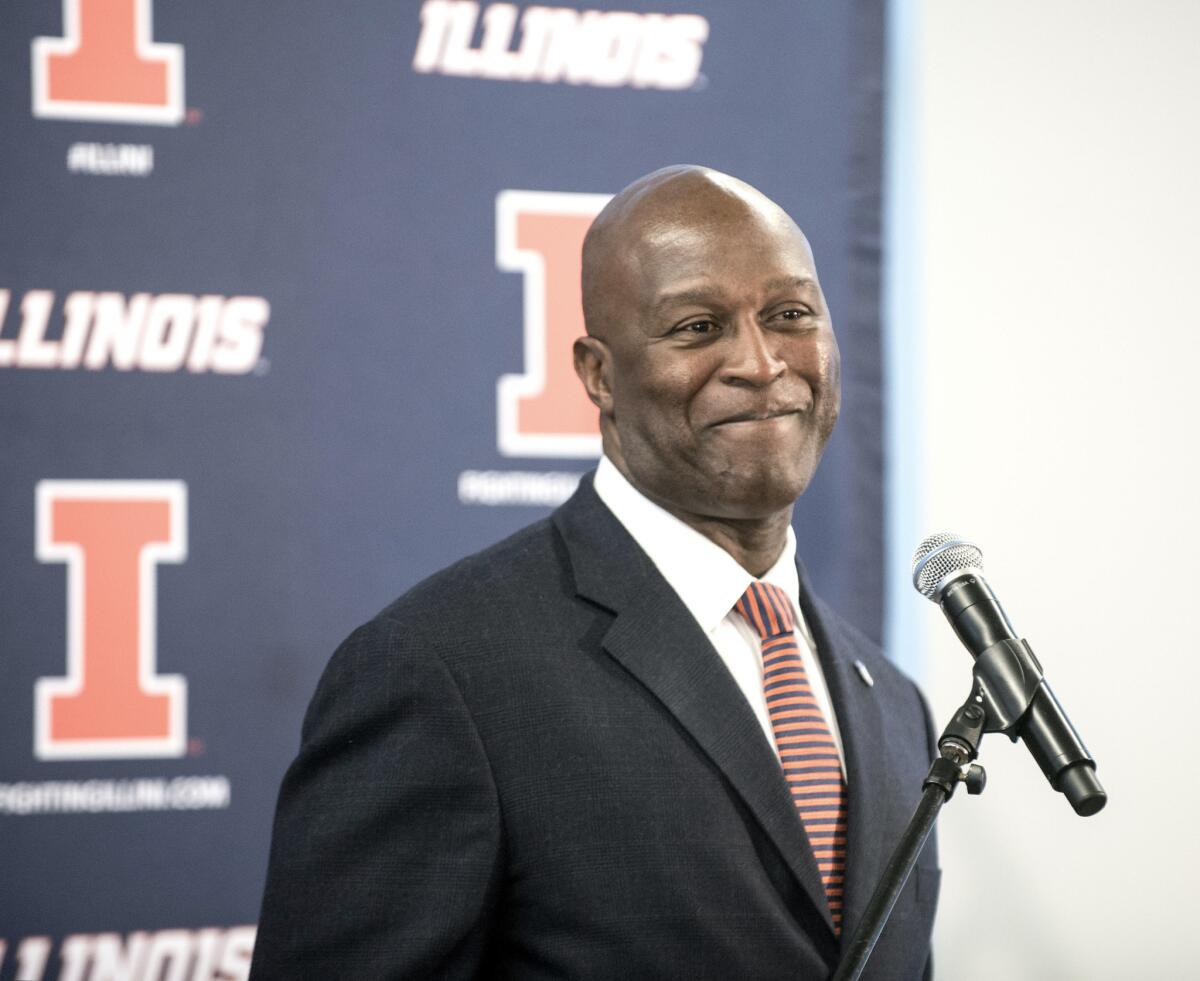 Lovie Smith talks to the media at a news conference to introduce Smith as the 25th head coach of the University of Illinois football team.