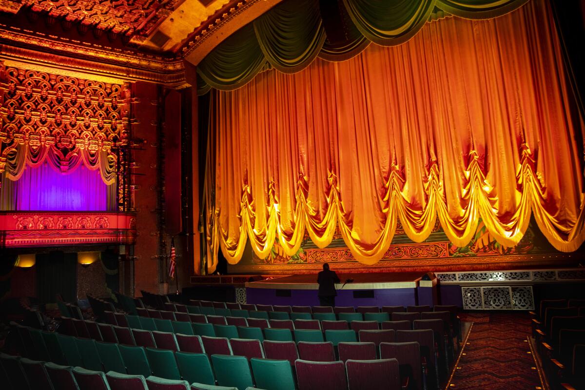 Hollywood, CA - March 19: The majestic El Capitan Theatre, in the heart of Hollywood, CA, prior to a screening of "Raya and the Last Dragon," as movie theaters reopen Friday, March 19, 2021. With Los Angeles County falling into the less-restrictive "red tier," COVID-19 restrictions have allowed for movie theaters to open and operate at 25% capacity. (Jay L. Clendenin / Los Angeles Times)