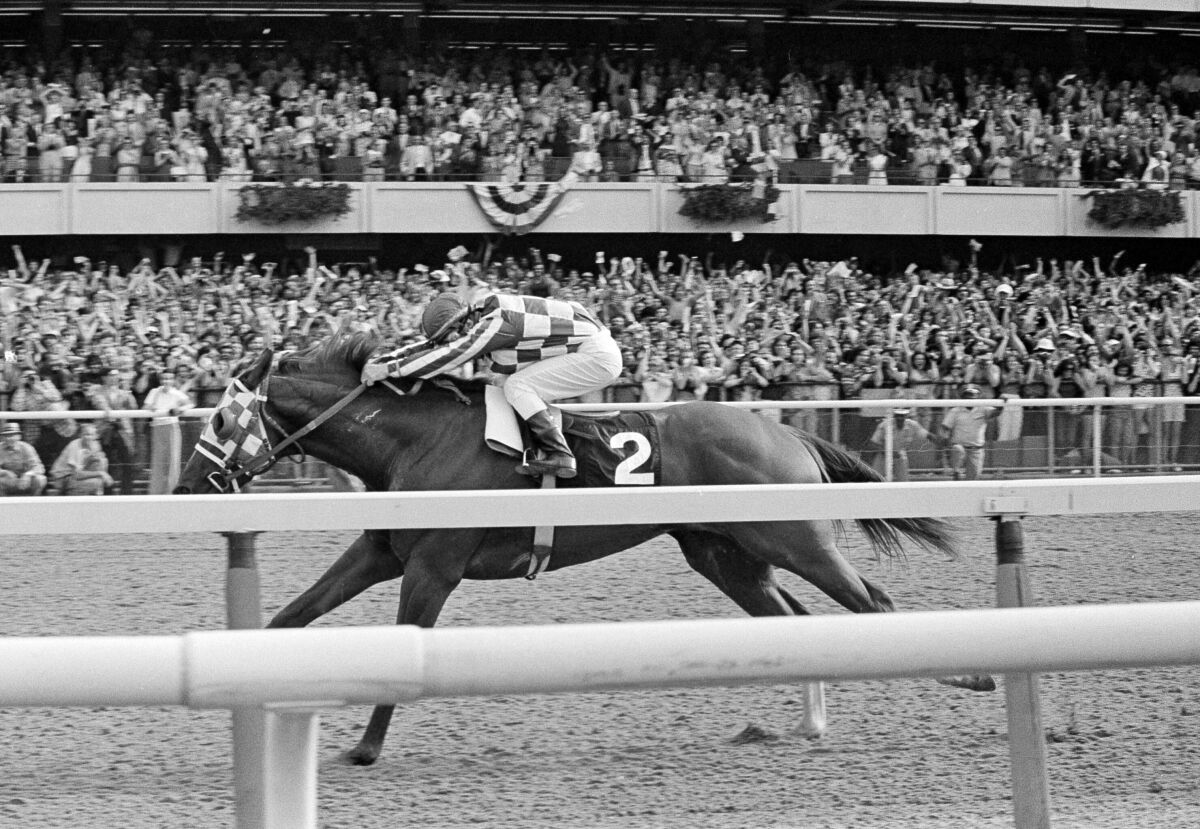Secretariat's recordsetting Belmont Stakes win to claim the Triple