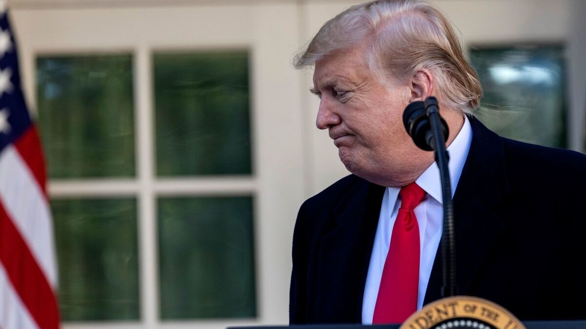 President Trump announces the end of the partial government shutdown Friday in a speech from the White House Rose Garden.