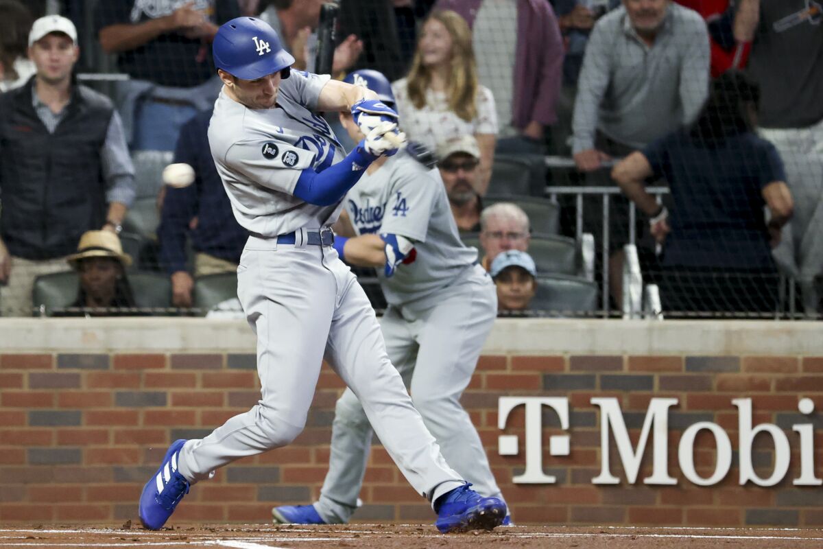 Dodgers second baseman Trea Turner strikes out to end the top of the first inning in Game 6 of the NLCS.