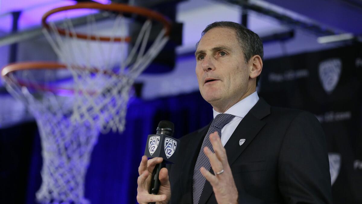 Pac-12 Commissioner Larry Scott speaks during the Pac-12 NCAA college basketball media day Thursday, Oct. 11, 2018, in San Francisco.