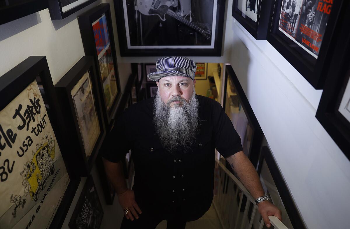 Bryan Ray Turcotte, publisher of Kill Your Idols, an indie publisher who makes zines and sleek books about Los Angeles skate, punk, and Chicano culture, is photographed last at his office in Los Angeles.