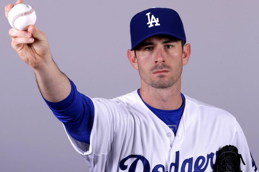 Brandon McCarthy poses for a photo during a spring training media session.