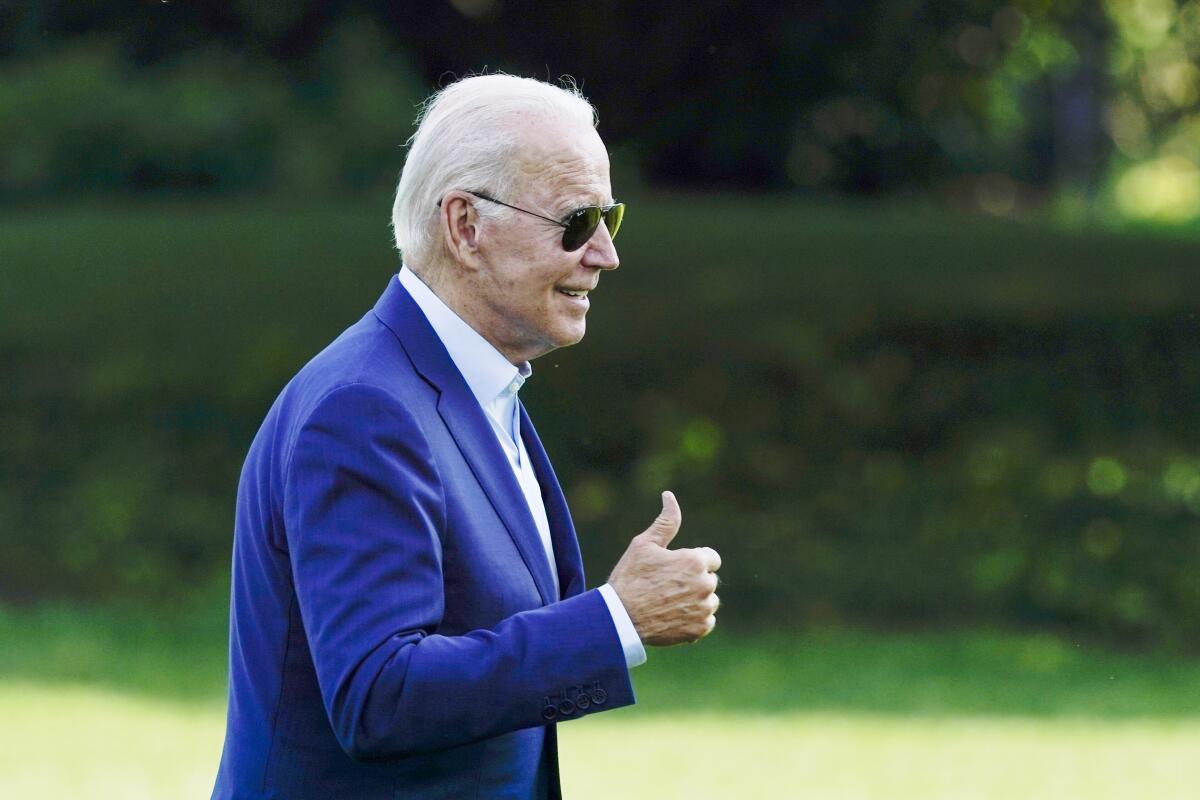 President Joe Biden walks on the South Lawn of the White House after stepping off Marine One on Wednesday.