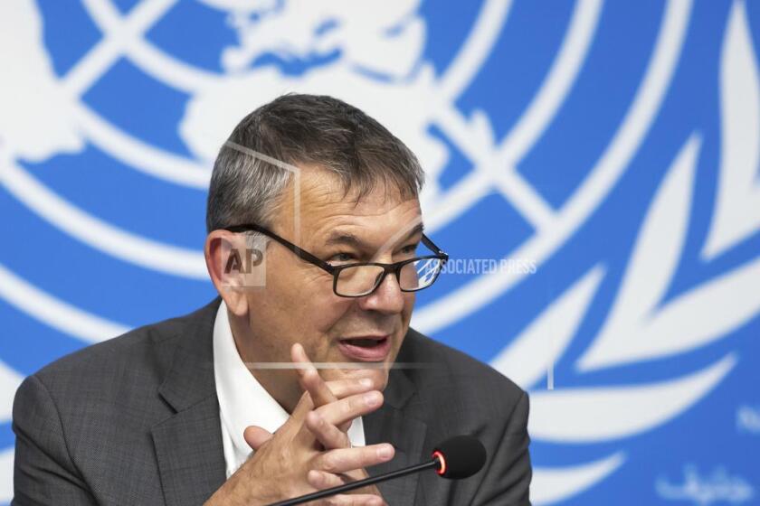 Philippe Lazzarini, Commissioner General of the United Nations Relief and Works Agency for Palestinian Refugees in the Near East (UNRWA), speaks during a press conference at the European headquarters of the United Nations in Geneva, Switzerland, Monday, Sept. 30, 2024. (Salvatore Di Nolfi/Keystone via AP)