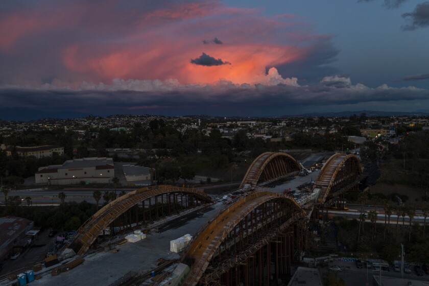 An aerial view of a dramatic sky over the Sixth Street Viaduct