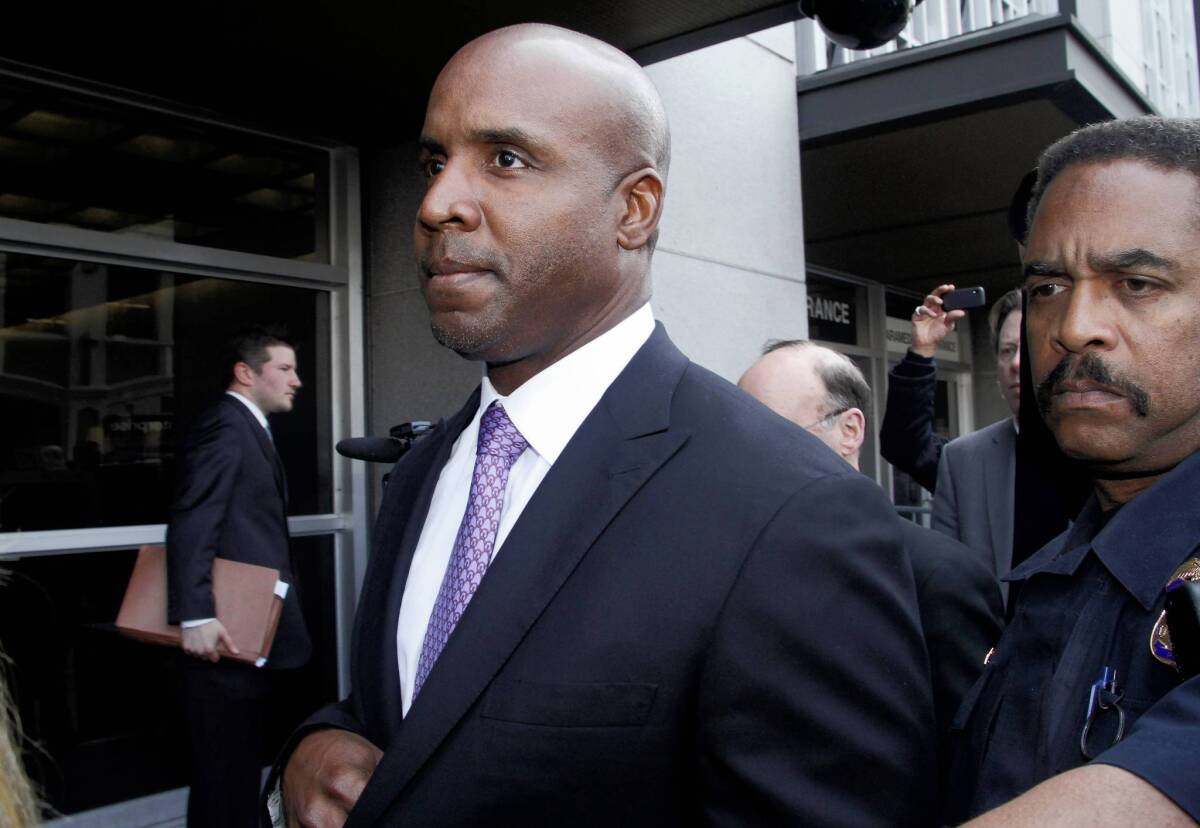 Barry Bonds leaves federal court in San Francisco in 2011 after being found guilty of one count of obstruction of justice. Bonds' appeal of his conviction was heard Wednesday by a three-judge panel of the 9th U.S. Circuit Court of Appeals.