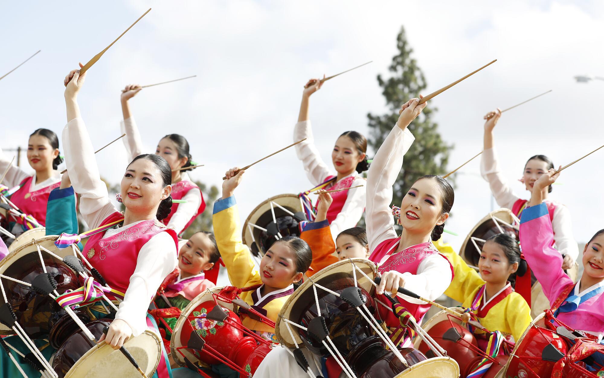 Korean Dance Company, presented by Kim Eung Hwa, participates in the 38th Annual Kingdom Day Parade in Leimert Park.