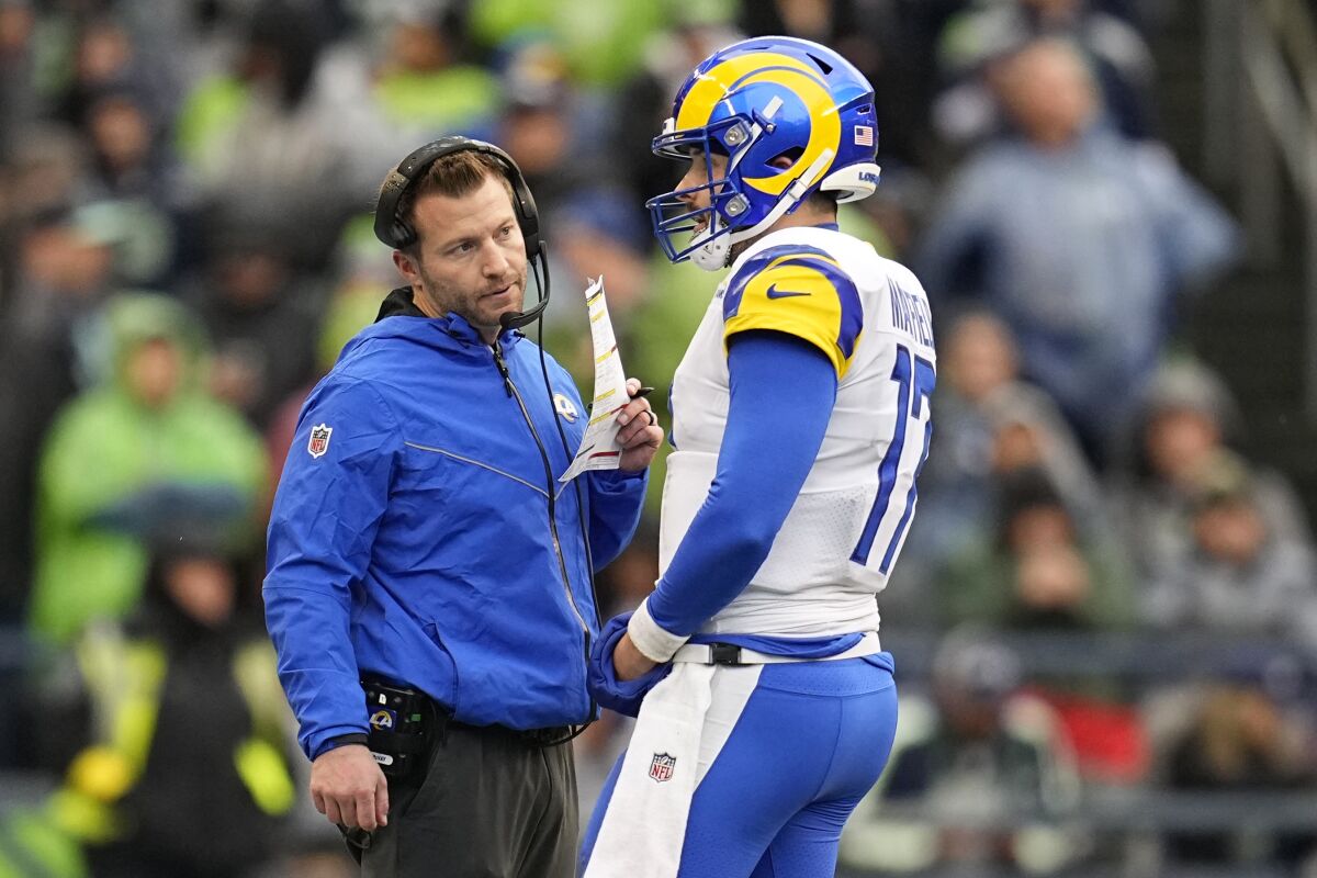 Rams coach Sean McVay and quarterback Baker Mayfield talk during the season finale at Seattle on Jan. 8, 2023.