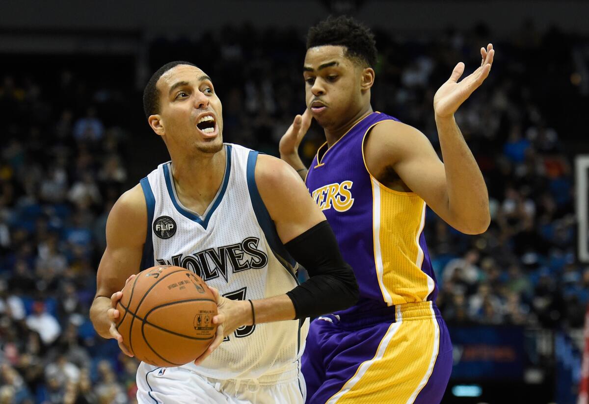 Lakers point guard D'Angelo Russell defends against Timberwolves guard Kevin Martin during the fourth quarter.