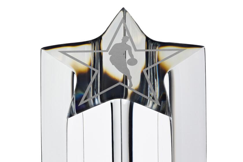 New All-Star game MVP trophy features a 14-inch crystal star-shaped column and 24-karat gold basketball embedded in column.