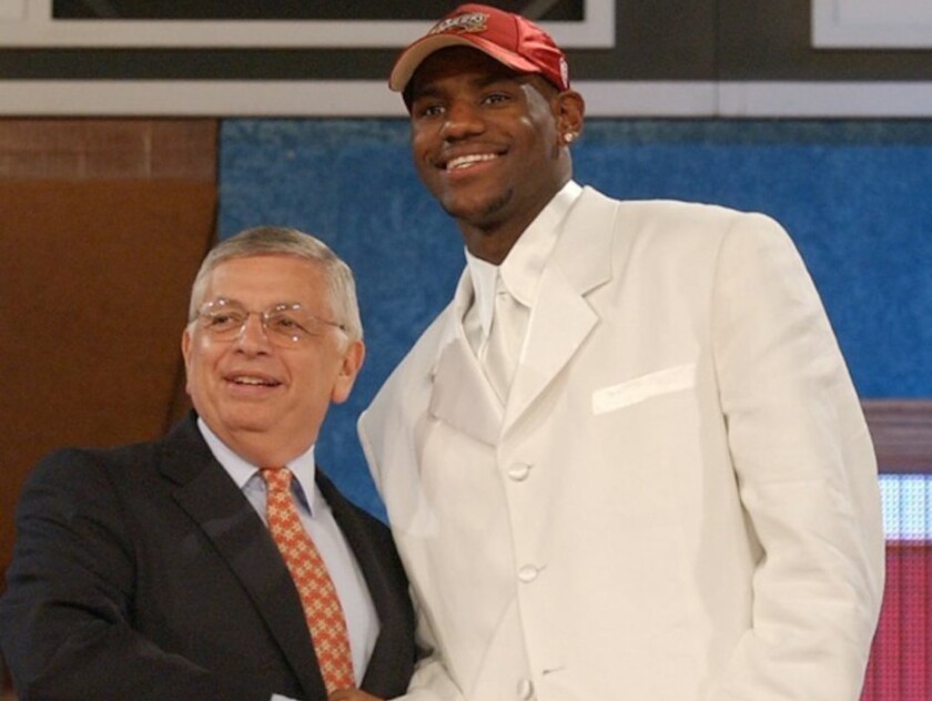 LeBron James shakes hands with NBA Commissioner David Stern after being selected No. 1 overall by the Cleveland Cavaliers in the 2003 NBA draft.