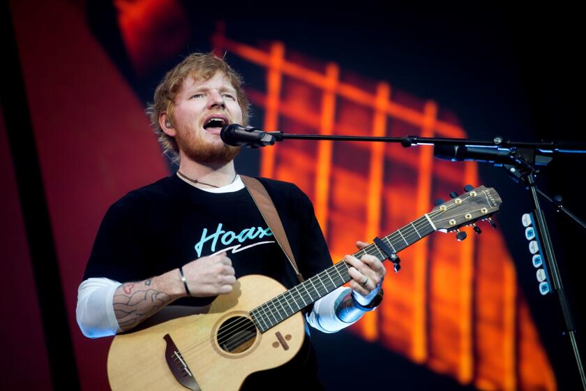 Mandatory Credit: Photo by Luca Piergiovanni/EPA-EFE/REX (10302578c) Ed Sheeran performs during a concert at Wanda Metropolitano stadium in Madrid, Spain, 11 June 2019. Ed Sheeran in concert, Madrid, Spain - 11 Jun 2019 ** Usable by LA, CT and MoD ONLY **