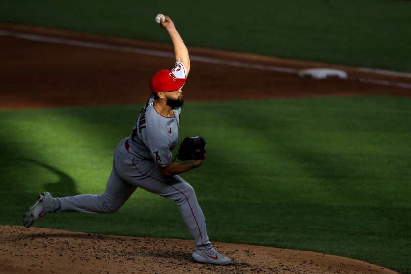 Angels starter Patrick Sandoval delivers to the Rangers in the fourth inning Aug. 8, 2020.