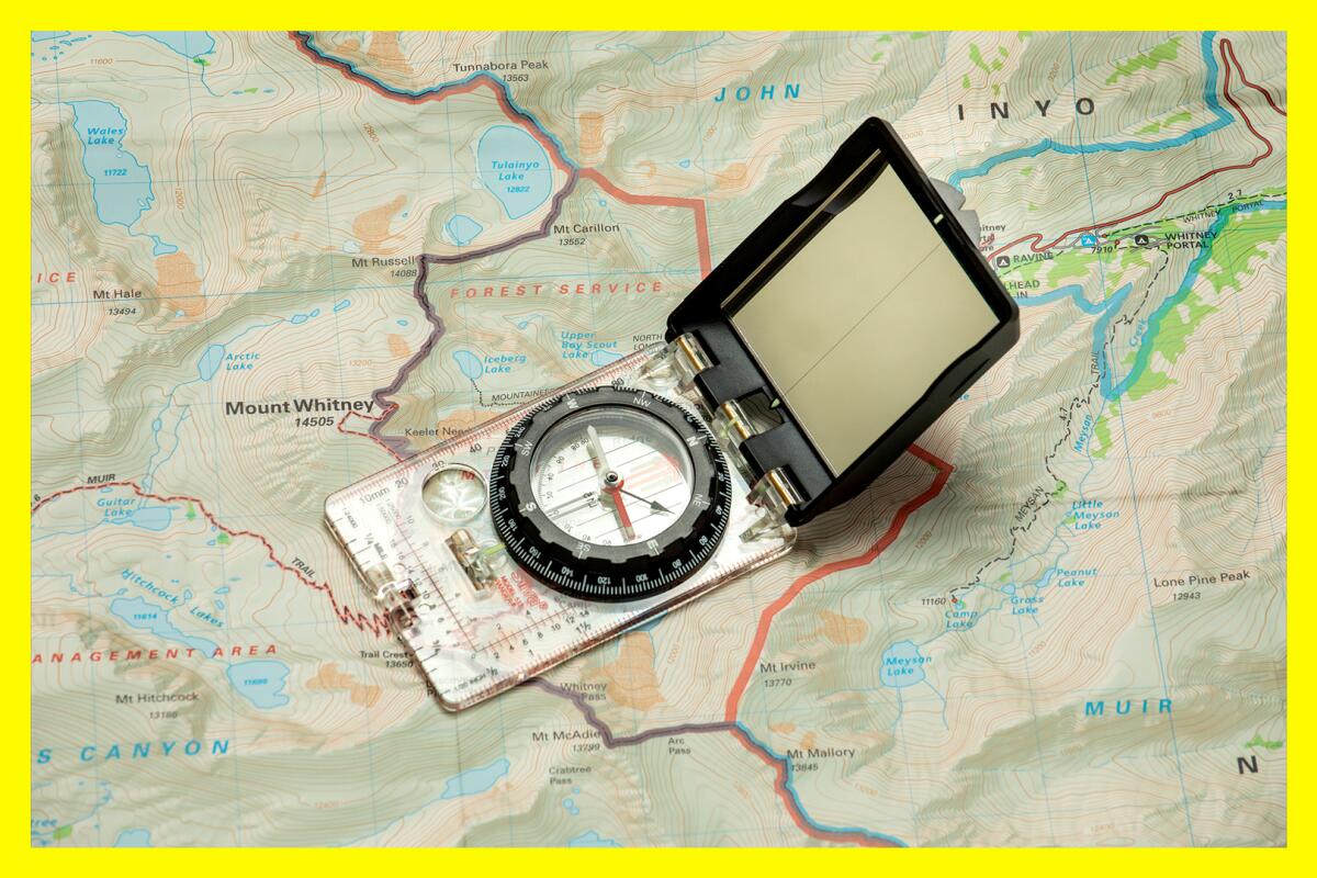 A hiker uses a compass to navigate through the woods. What area of physics  does this involve?