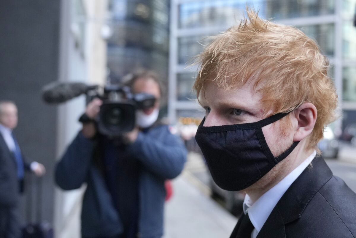 Musician Ed Sheeran arrives at the Rolls Building, High Court in central London, Tuesday, March 15, 2022. Songwriters Sami Chokri and Ross O'Donoghue claimed Sheeran's 2017 hit song 'Shape of You' infringes parts of one of their songs. Sheeran denied he "borrows" ideas from unknown songwriters.(AP Photo/Frank Augstein)