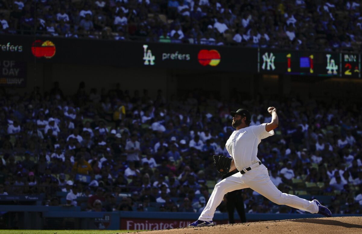 Dodgers starter Clayton Kershaw delivers against the New York Yankees on Sunday.