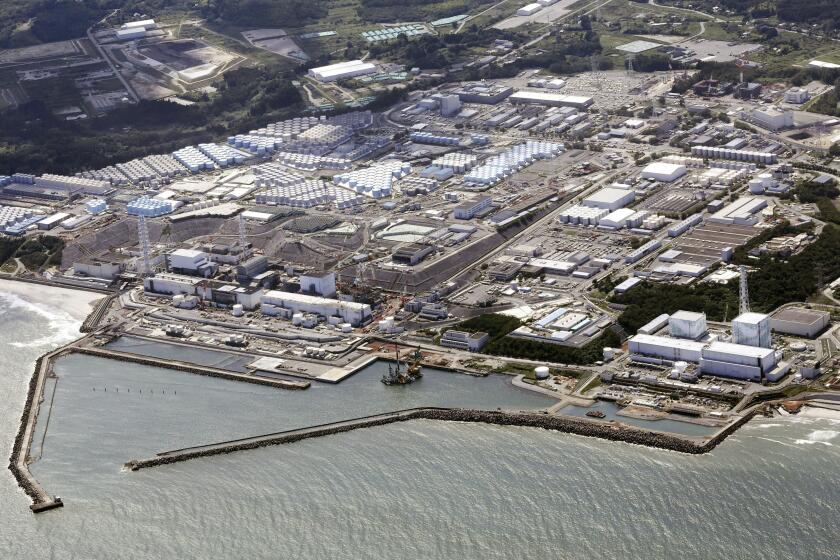 FILE - This aerial view shows the Fukushima Daiichi nuclear power plant in Fukushima, northern Japan, on Aug. 24, 2023, shortly after its operator Tokyo Electric Power Company Holdings TEPCO began releasing its first batch of treated radioactive water into the Pacific Ocean. Japan's wrecked Fukushima nuclear power plant said it began releasing a second batch of treated radioactive wastewater into the sea on Thursday, Oct 5, 2023, after the first round of discharges ended smoothly.(Kyodo News via AP, File)