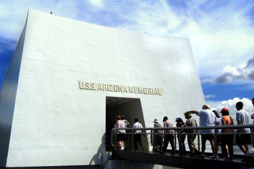 The U.S.S. Arizona Memorial pays tribute to a major site of casualties in the air raid.