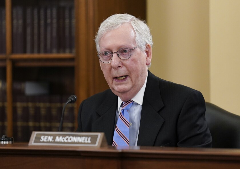 FILE - In this April 20, 2021, file photo, Senate Minority Leader Mitch McConnell, R-Ky., talks after a GOP policy luncheon