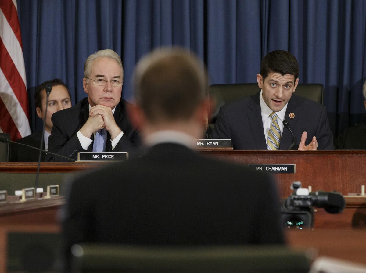 A marked man faces the music: CBO Director Doug Elmendorf (foreground), is grilled by House Budget Committee Chairman Rep. Paul Ryan, R-Wis. in Febr. Listening at left is Rep. Tom Price, R-Ga., who will assume the committee chair in January.