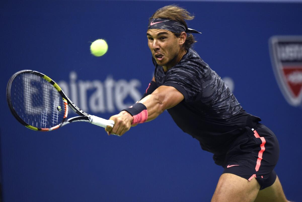 Rafael Nadal hits a return against Fabio Fognini during the U.S. Open on Friday.