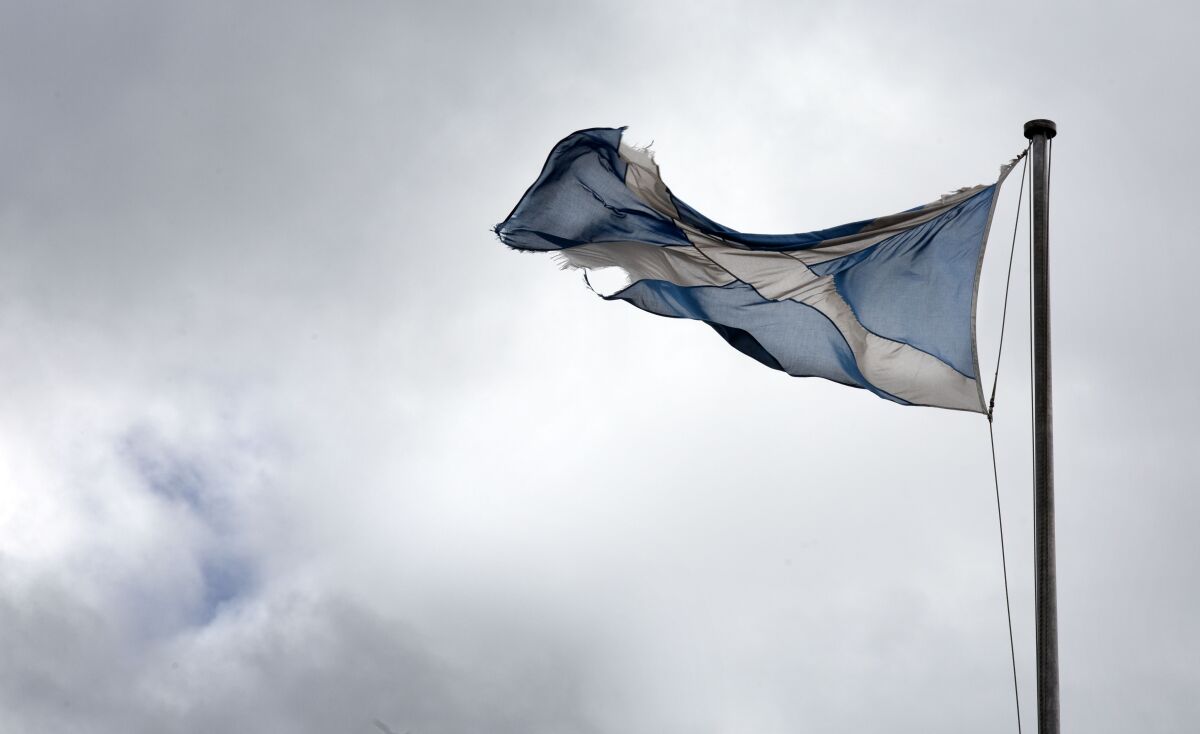 Scottish flag hangs over the Royal Mile in Edinburgh, Scotland