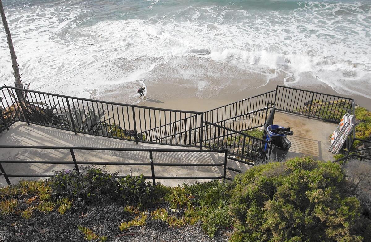 The stairs leading to the beach at Agate Street in Laguna Beach were damaged by large waves and high tide and have been shut since 2015.