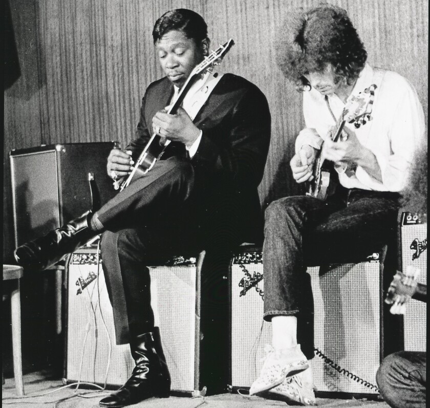 B.B. King and Eric Clapton are shown playing together in 1967