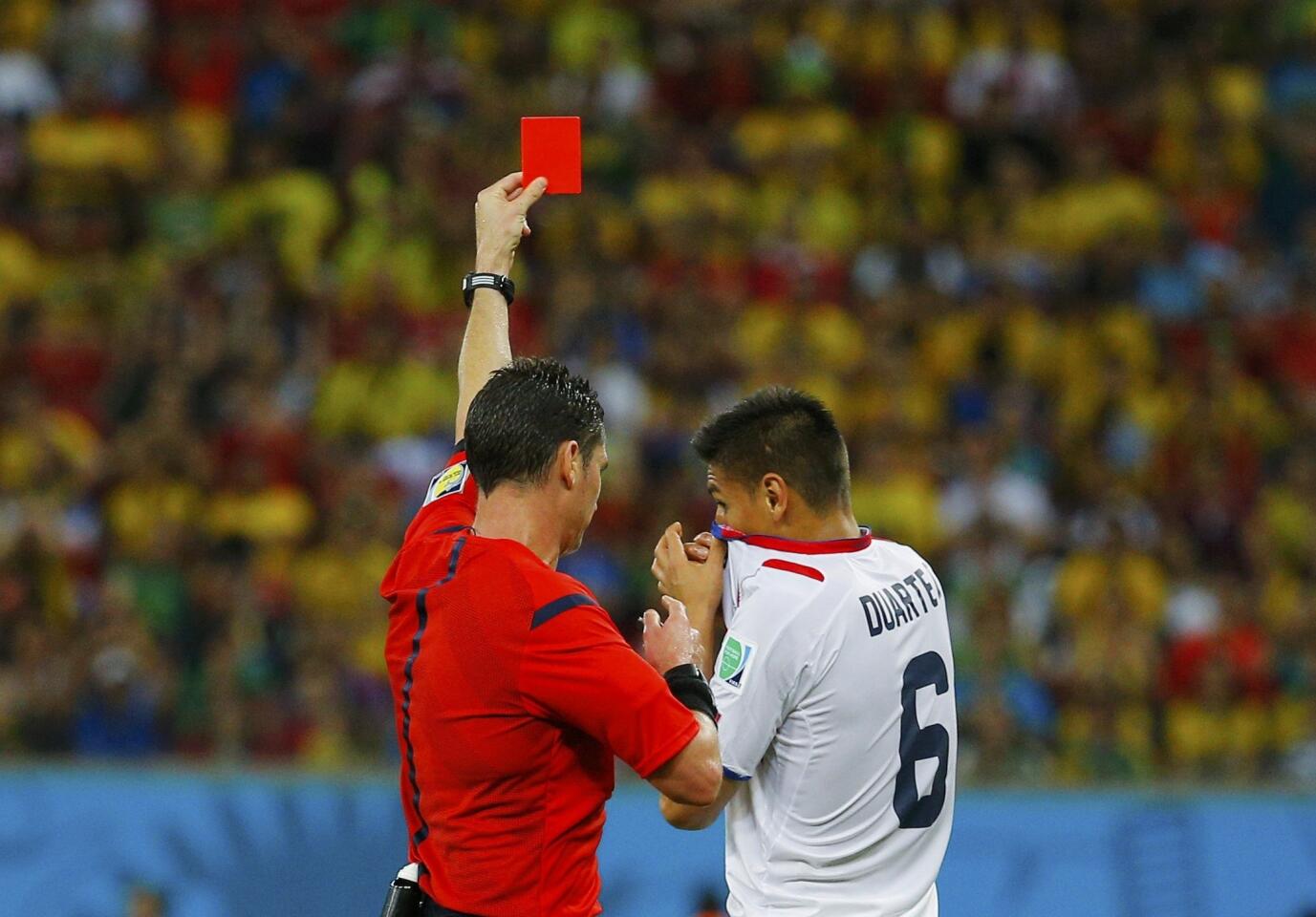 Costa Rica's Duarte is shown the red card by the referee during their 2014 World Cup round of 16 game against Greece at the Pernambuco arena in Recife