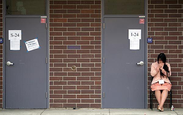 Los Angeles High school student Sharmaine Cerezo, 17, waits outside a classroom at Sacramento High School for the interview portion of the Academic Decathlon State Championship.