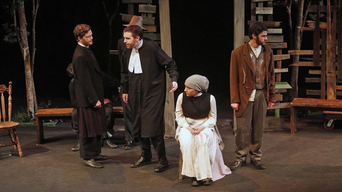 Burbank High students rehearse a scene from "The Crucible" at the Colony in Burbank. The play will run through Saturday.