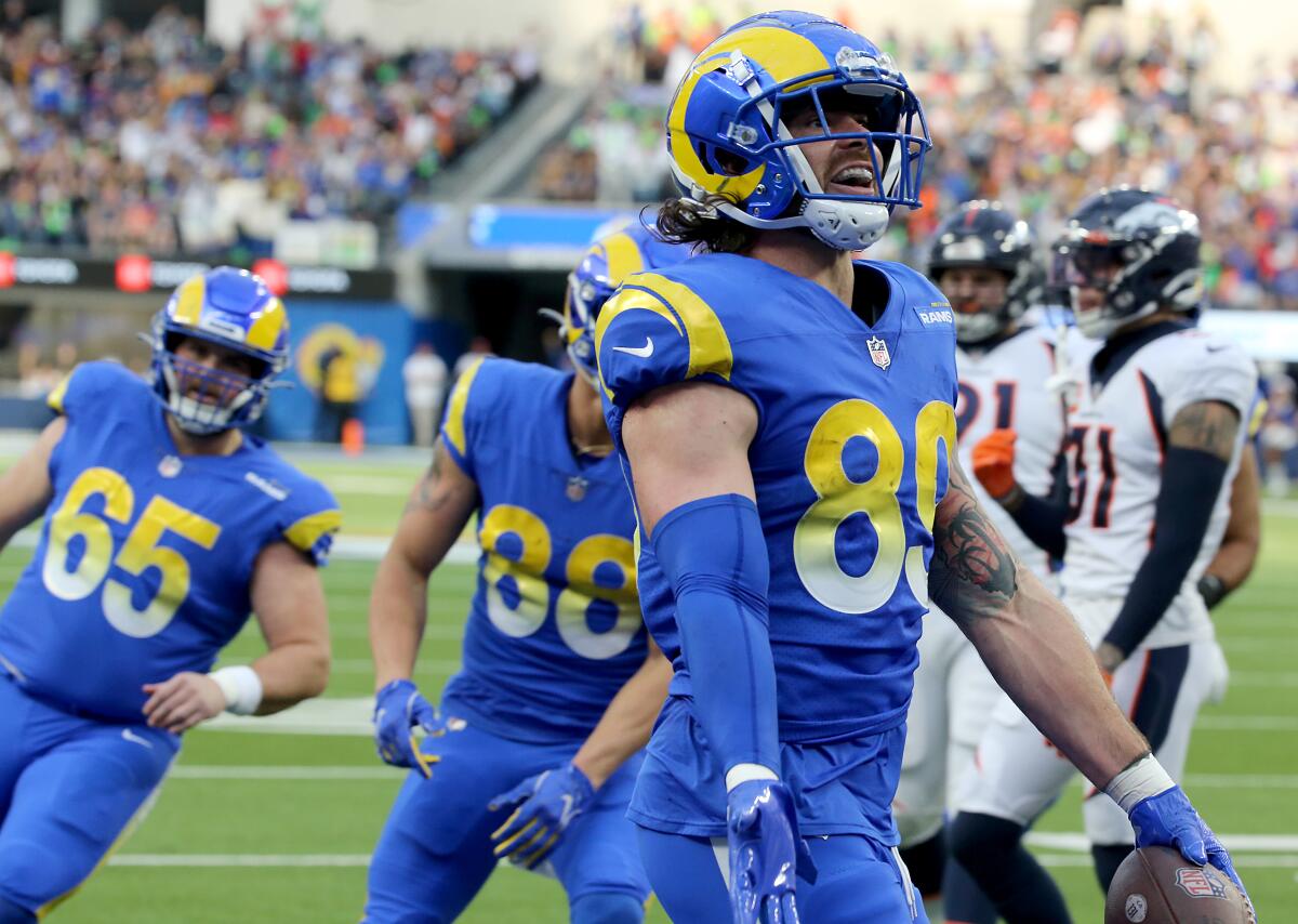 Rams tight end Tyler Higbee celebrates after scoring a touchdown against the Broncos in the first quarter.